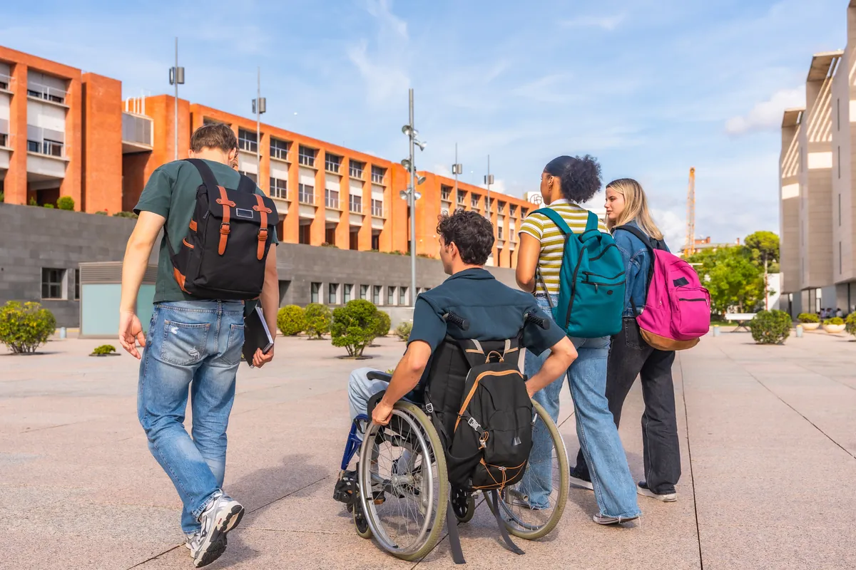 Students walking through a college campus in Karnataka